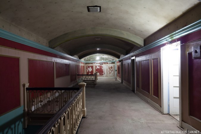 The ceiling of the foyer is painted with stars, perhaps echoing the semi atmospheric motif of the auditorium dome.