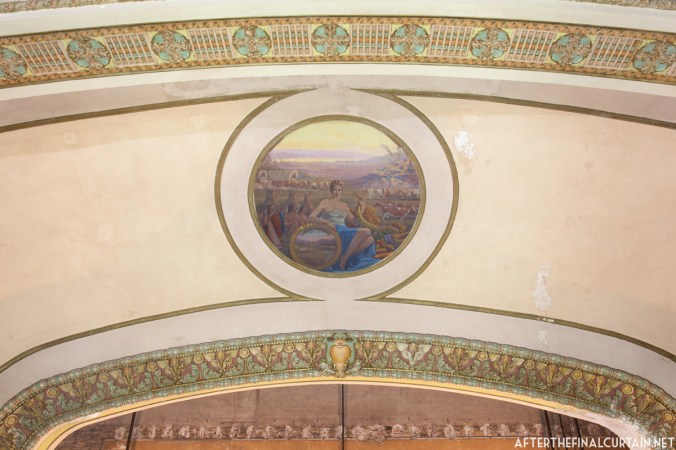 The mural on the proscenium arch was painted by William Peaco.