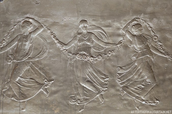 A close up of some of the plaster-work on the side of the auditorium.