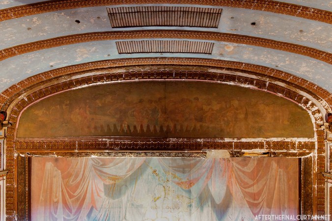 The mural above the proscenium is entitled, “The Allegory of the Muses,” and was painted by Harry Hawkins, a local artist.