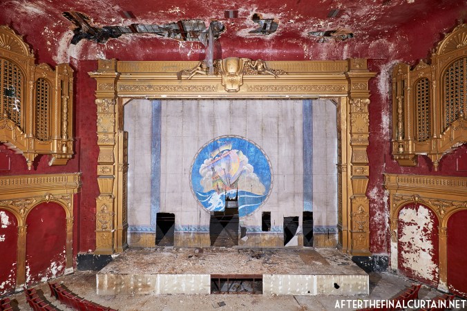 The fire curtain and proscenium arch of the California Theatre in San Diego, CA